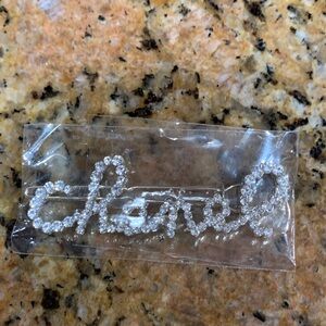 Absolutely stunning Chanel hair clip with Crystals in writing Chanel ,must have!